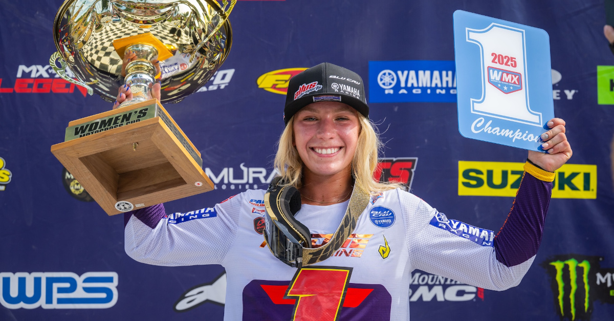 WMX racer celebrating on the podium